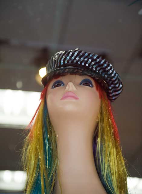 Beauty supply shop window on Grand Avenue in Oakland